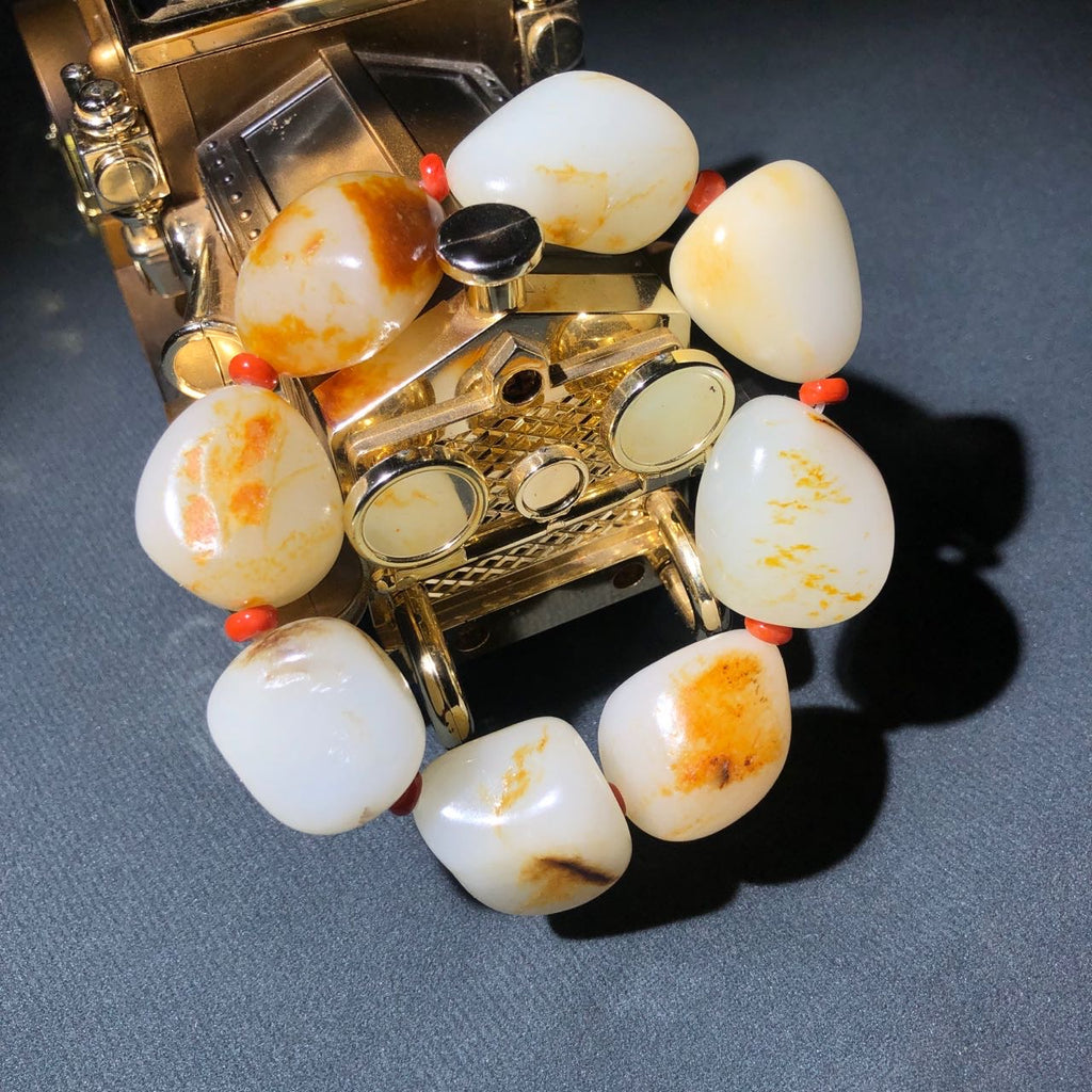 和田玉-红皮洒金籽料【精品手串】